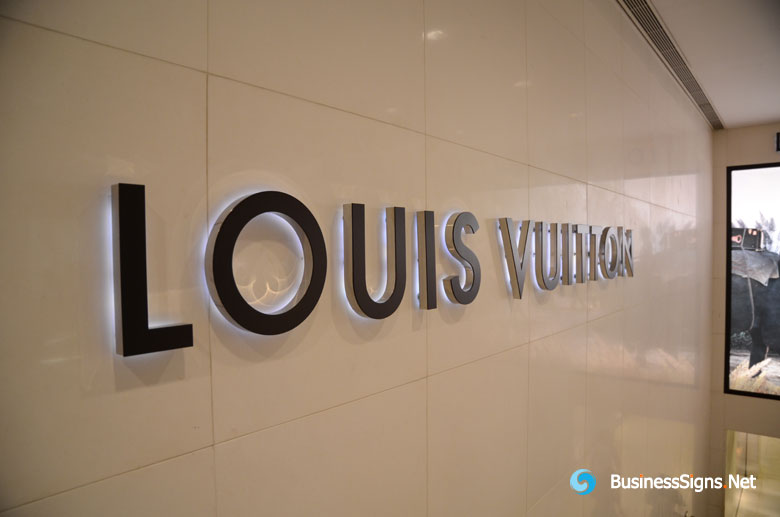 Louis Vuitton Boutique. Signboard Logo Brend Sign of Louis Vuitton